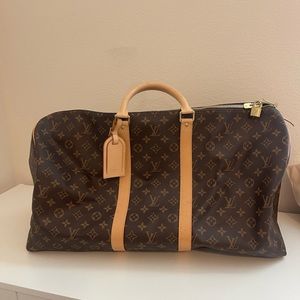 LV SOFT LUGGAGE TOTE MEDIUM SIZE ONLY USED 2 TIMES